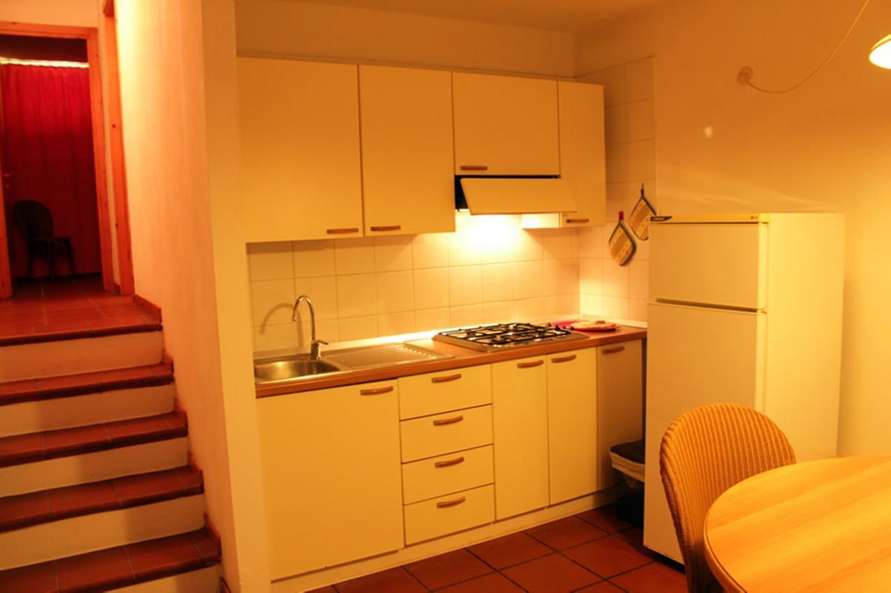 Residence Portolaconia Appartamenti Cannigione Zimmer foto